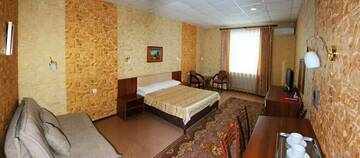Фото номера Стандартный семейный номер Гостиница Барбарис г. Биробиджан 4